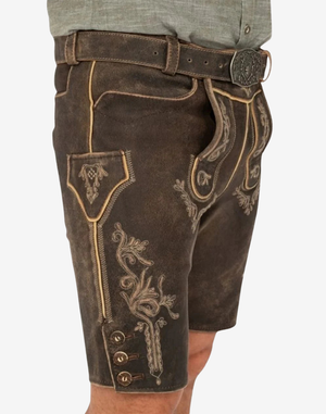Bavaria Crest Lederhosen for Men angled front view showing ornate thigh embroidery, stitched side pocket, and buttoned leg hem