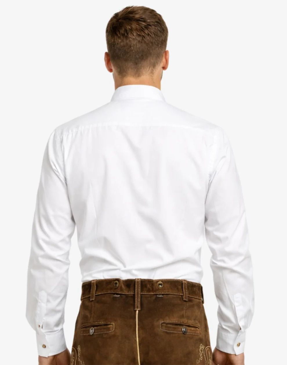 Man wearing a white dress shirt and brown pants on a white background