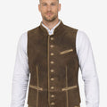 Model wearing Bavarian heritage leather vest paired with white shirt and lederhosen, highlighting rustic suede texture, traditional styling and premium craftsmanship for Oktoberfest outfit.