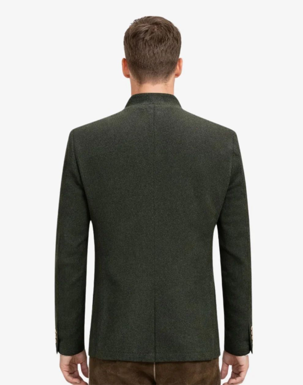 Green blazer worn by a person on a white background