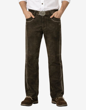 Brown jeans worn by a person on a white background