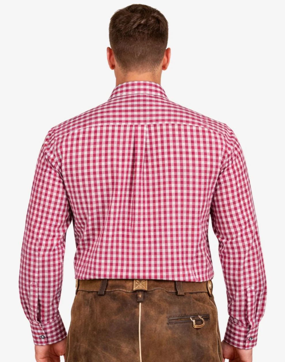 Man wearing a red and white checkered shirt with brown leather pants on a white background