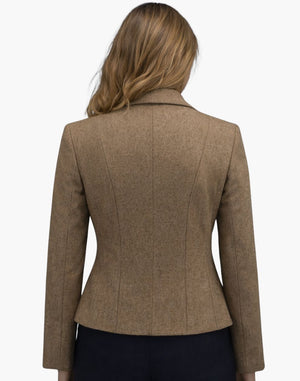 Brown blazer worn by a person on a white background