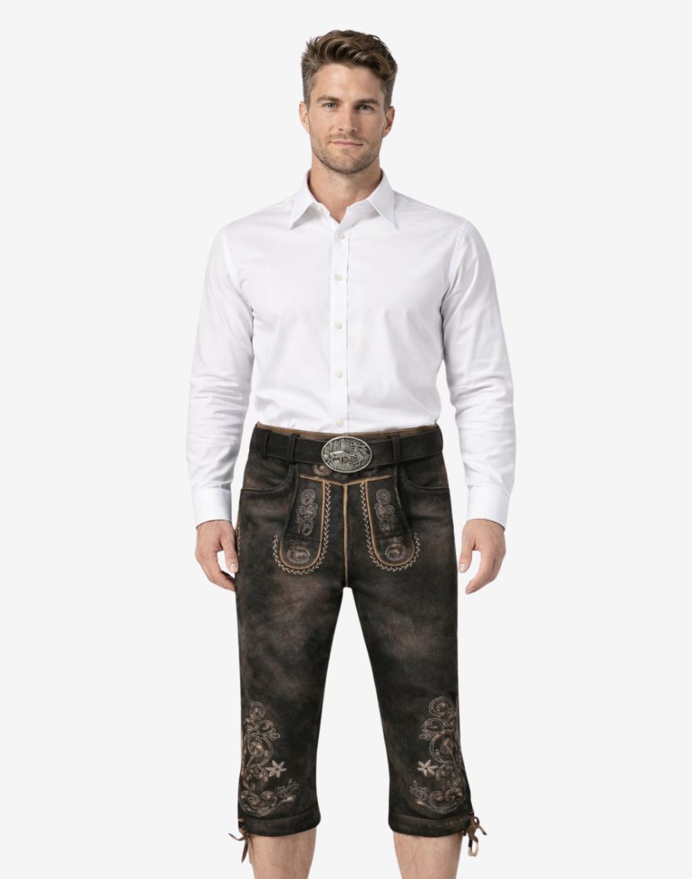 Front view of model wearing classic Bavarian Bundhosen shorts in dark leather with traditional embroidery and Oktoberfest knee tie details