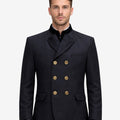 Front view of model wearing Classic Bavarian Jacket for Men in navy with double breasted design and brass buttons