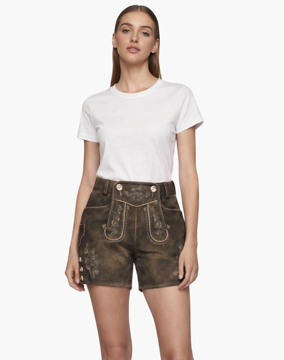 Woman wearing a white t-shirt and brown leather shorts on a white background