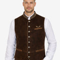 Model wearing classic brown Alpine embroidered vest paired with traditional Bavarian attire, ideal for Oktoberfest and cultural events.