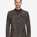 Front view of model wearing Classic German Leather Trachten Jacket in rustic brown with traditional Bavarian stand collar and buttons