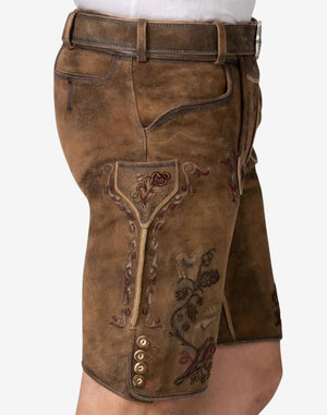 Brown leather shorts with embroidery on a white background
