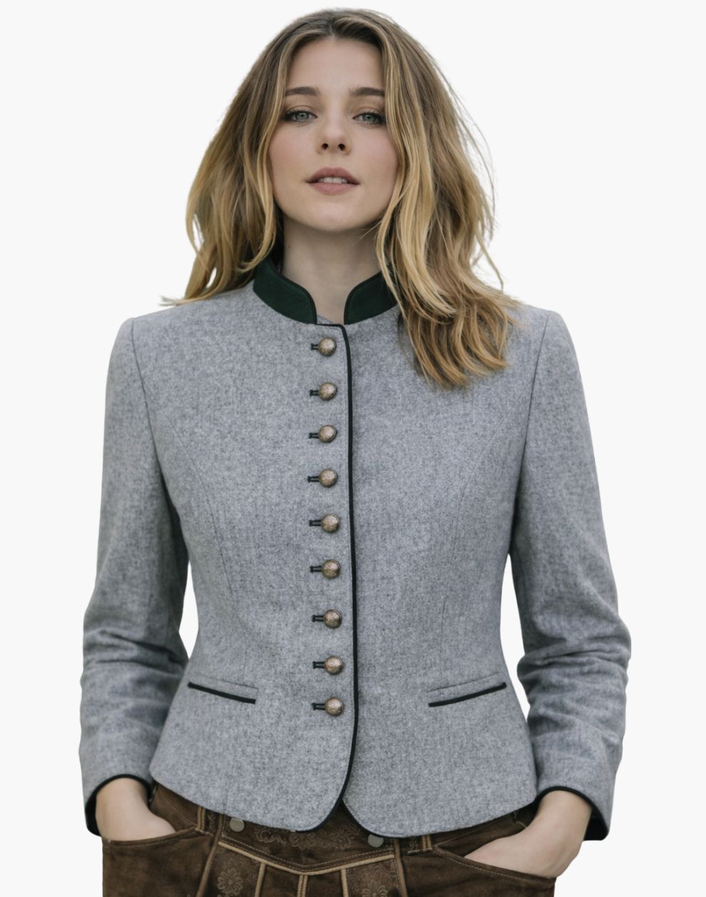 Woman wearing a classic German Trachten jacket in light grey with a green collar, decorative buttons, and fitted traditional Bavarian design, paired with brown lederhosen, against a white background.