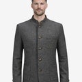 Front view of classic heritage jacket for men in grey wool featuring stand collar, traditional buttons and Bavarian inspired tailoring.