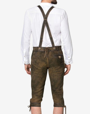 Rear view of classic Oktoberfest bundhosen for men showing crossed suspenders, back pocket detail and leather finish