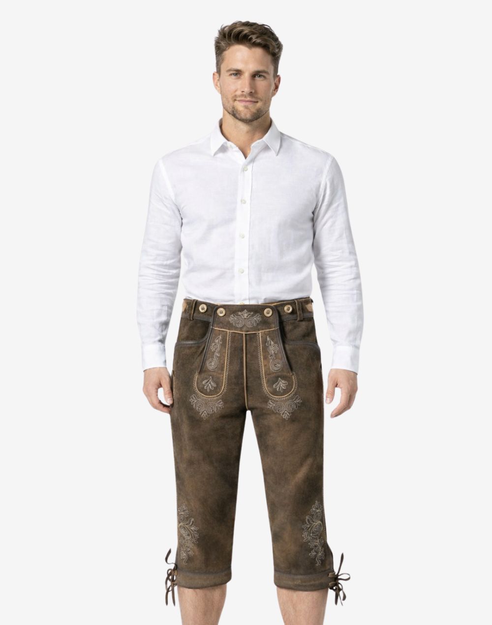 Front view of model wearing Classic Oktoberfest Bundhosen Men in brown leather with traditional Bavarian embroidery and knee tie details
