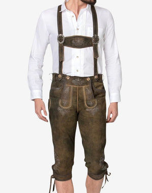 Mens Oktoberfest bundhosen worn with suspenders highlighting embroidered bib flap and authentic alpine outfit styling