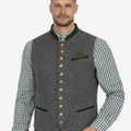 Model wearing classic trim mens gray Bavarian vest paired with traditional outfit, ideal for Oktoberfest and Alpine occasions.