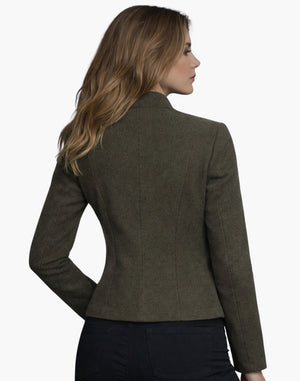 Woman wearing a green blazer on a white background