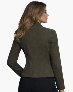 Woman wearing a green blazer on a white background