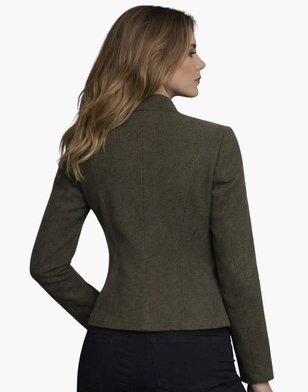 Woman wearing a green blazer on a white background