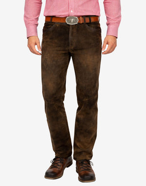 Brown pants worn by a person on a white background