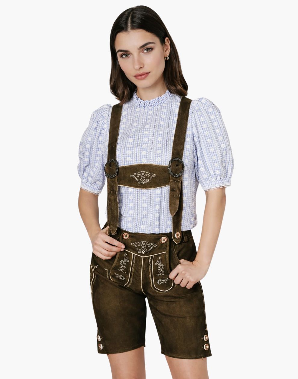 Woman wearing embroidered brown leather lederhosen shorts with a blue  shirt , styled in traditional Bavarian Oktoberfest fashion.