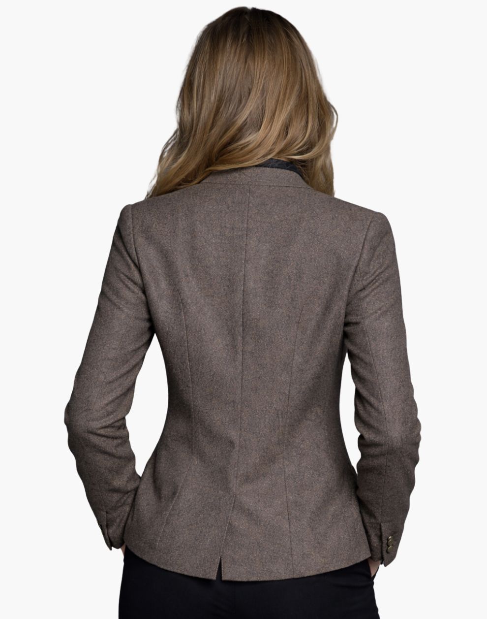 Brown blazer worn by a person on a white background