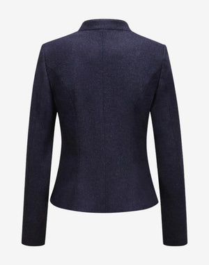 Back view of a women’s navy blue wool trachten jacket featuring a stand-up collar, tailored slim fit, long sleeves, and clean Alpine-inspired heritage design.