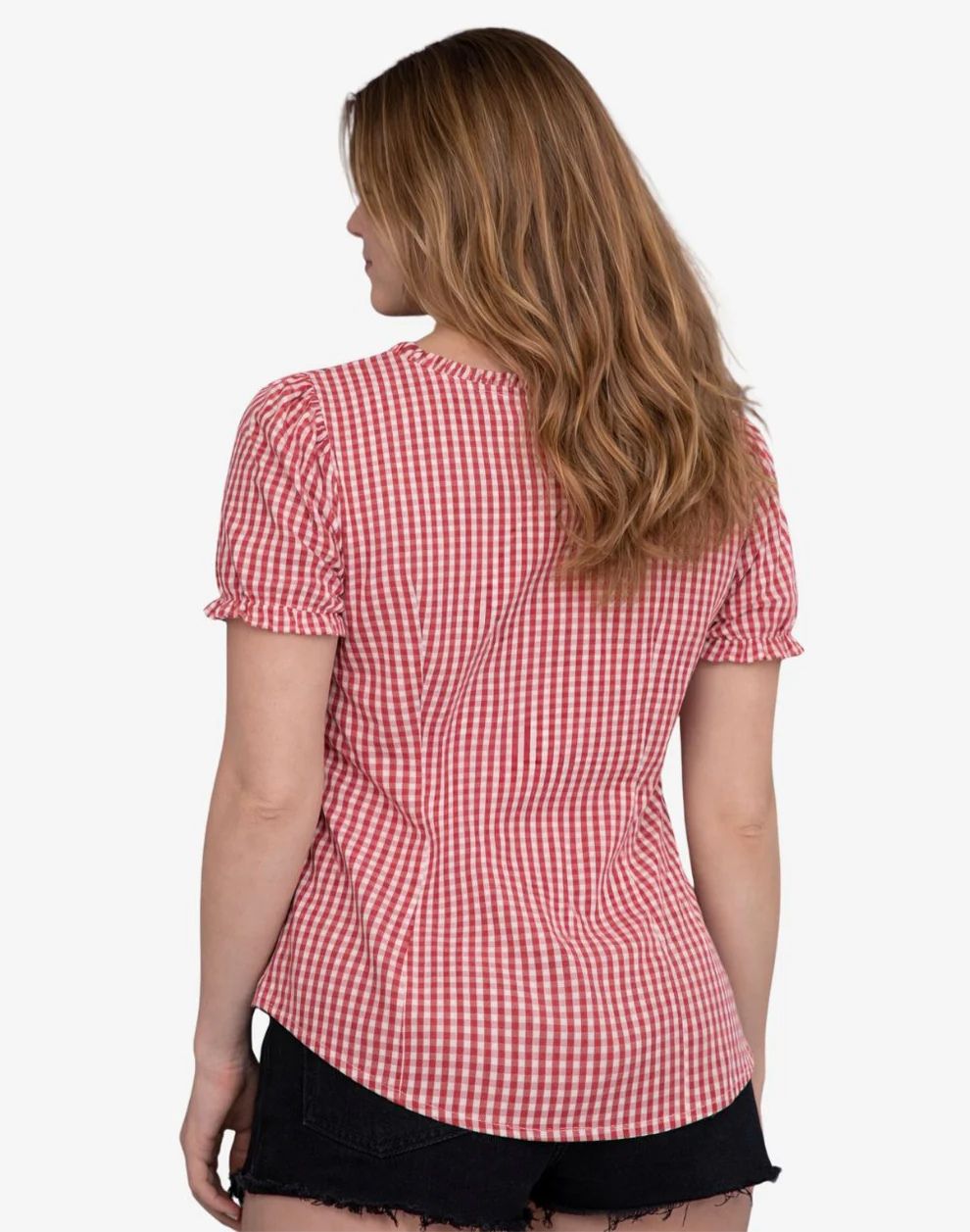 Woman wearing a red and white checkered shirt on a white background