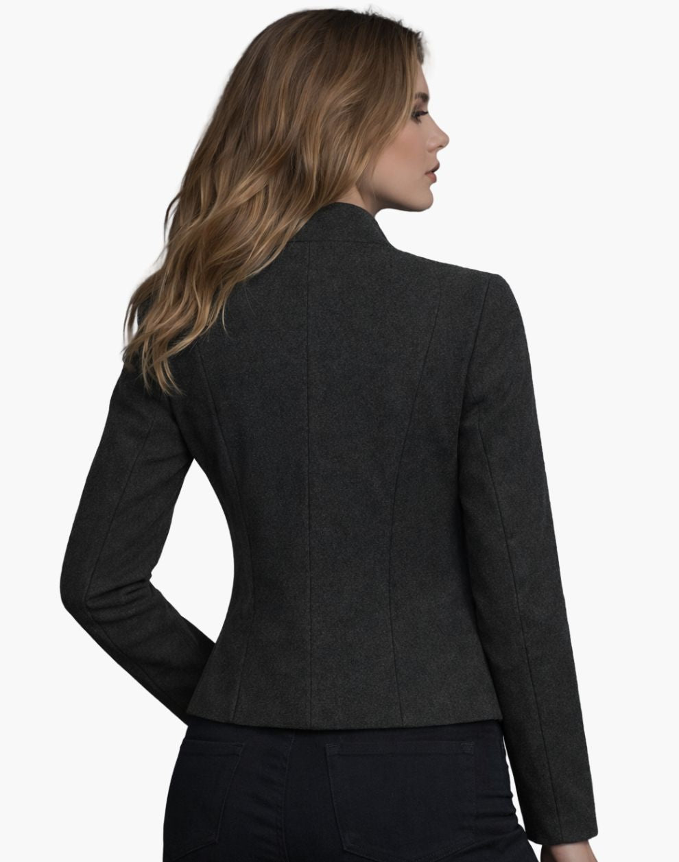 Woman wearing a dark gray blazer on a white background