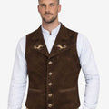 Model wearing embroidered dark brown suede Trachten vest with white shirt and lederhosen, highlighting traditional Bavarian alpine fashion, detailed embroidery, premium material and Oktoberfest outfit style.
