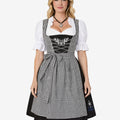Front view of festival ready dirndl dress worn by model featuring check apron, lace blouse and classic Bavarian fit style