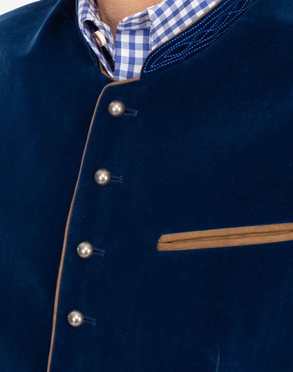 Close up detail of blue Trachten vest showing decorative metal buttons, embroidered Bavarian collar pattern and traditional Oktoberfest waistcoat craftsmanship