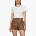 Woman wearing a white t-shirt and brown shorts on a white background