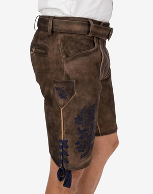 Folk Fest Lederhosen for Men side view showing embroidered thigh motif, stitched pocket, and lace-up leg ties with blue ribbon