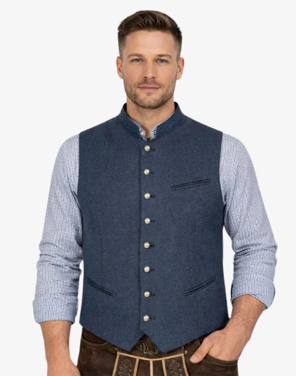 Man wearing a blue vest over a checkered shirt on a white background
