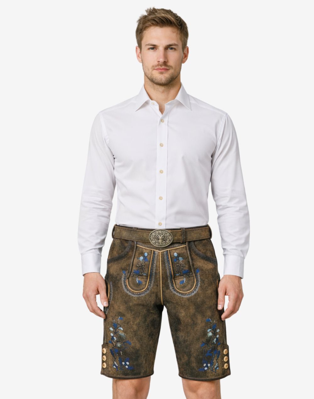 Model wearing German traditional lederhosen for men in brown leather with blue Bavarian embroidery and belt buckle