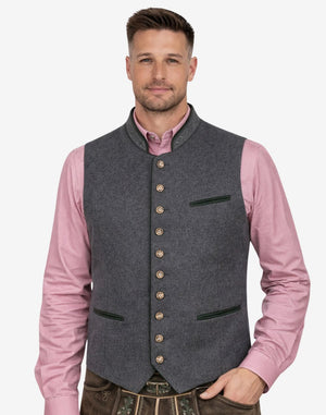 Male model wearing grey wool Alpine piping vest paired with traditional Bavarian outfit, suitable for Oktoberfest and cultural events.