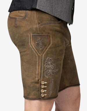 Men’s handmade Bavarian lederhosen crafted from brown leather featuring classic stitched detailing and knee-length design
