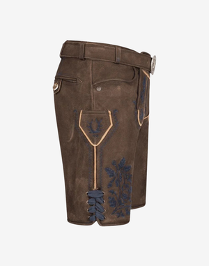 Heritage Line Lederhosen for Men side view showing stitched pocket, blue embroidered thigh motif, and lace-up leg hem
