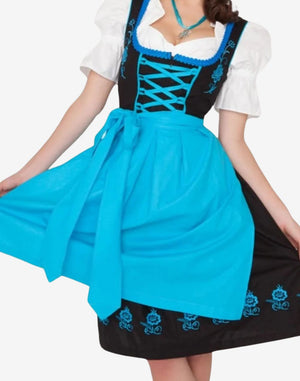 Model wearing heritage style dirndl with green apron, fitted bodice and authentic Oktoberfest traditional styling