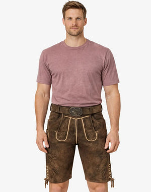Man wearing a brown leather outfit with a belt on a white background