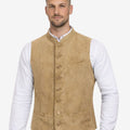 Model wearing light brown suede Trachten vest paired with white shirt and lederhosen for Oktoberfest outfit.