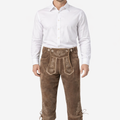 Front view of model wearing luxury leather Bundhosen for men in brown with Bavarian embroidery and traditional Oktoberfest knee tie design