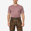 Front view of model wearing Men Alpine Champion Lederhosen in brown leather with Bavarian embroidery and traditional belt buckle