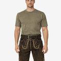 Front view of model wearing Men Regal Crest Lederhosen in brown leather with Bavarian crest embroidery and belt buckle