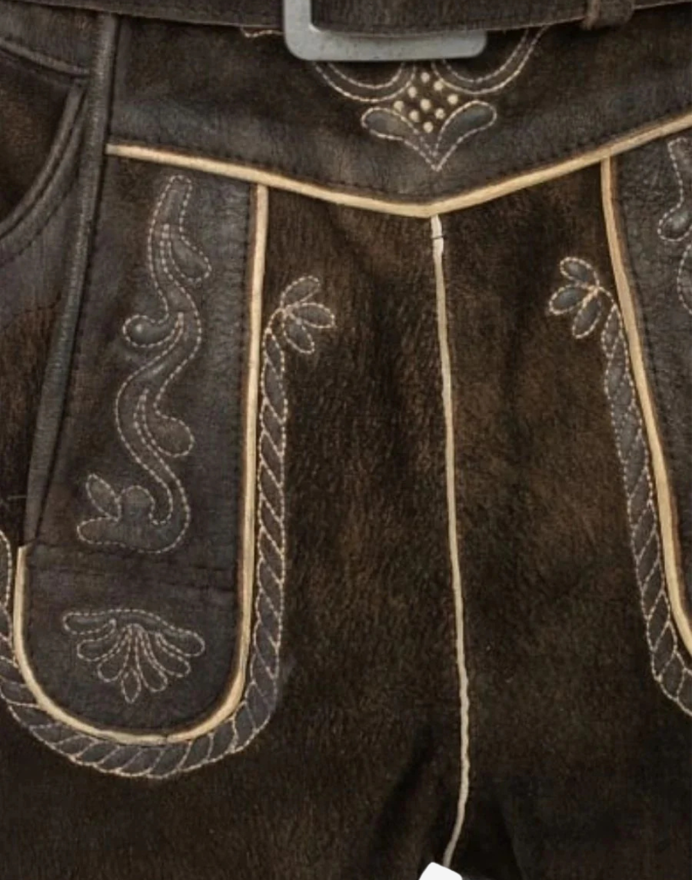 Men Regal Crest Lederhosen close-up of embroidered front bib stitching with contrast piping and decorative pattern