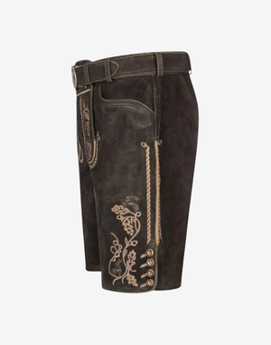 Side view showing braided trim panel, vine embroidery, and buttoned hem on charcoal suede shorts