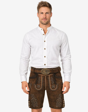 Model wearing vintage brown lederhosen for men with traditional Bavarian embroidery and classic belt buckle