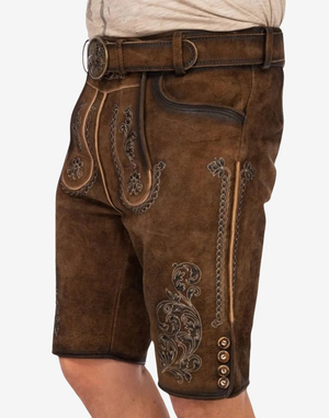 Men Vintage Brown Lederhosen angled front view highlighting embroidered bib panels, contrast piping, and thigh scrollwork design