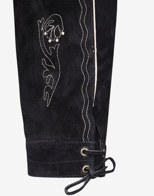 Close-up of men’s bundhosen ankle cuff with lace-up tie, metal eyelets and floral embroidery