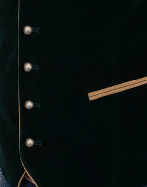Close up detail of mens Bavarian heritage vest showing traditional horn buttons, wool texture and classic Trachten design.
